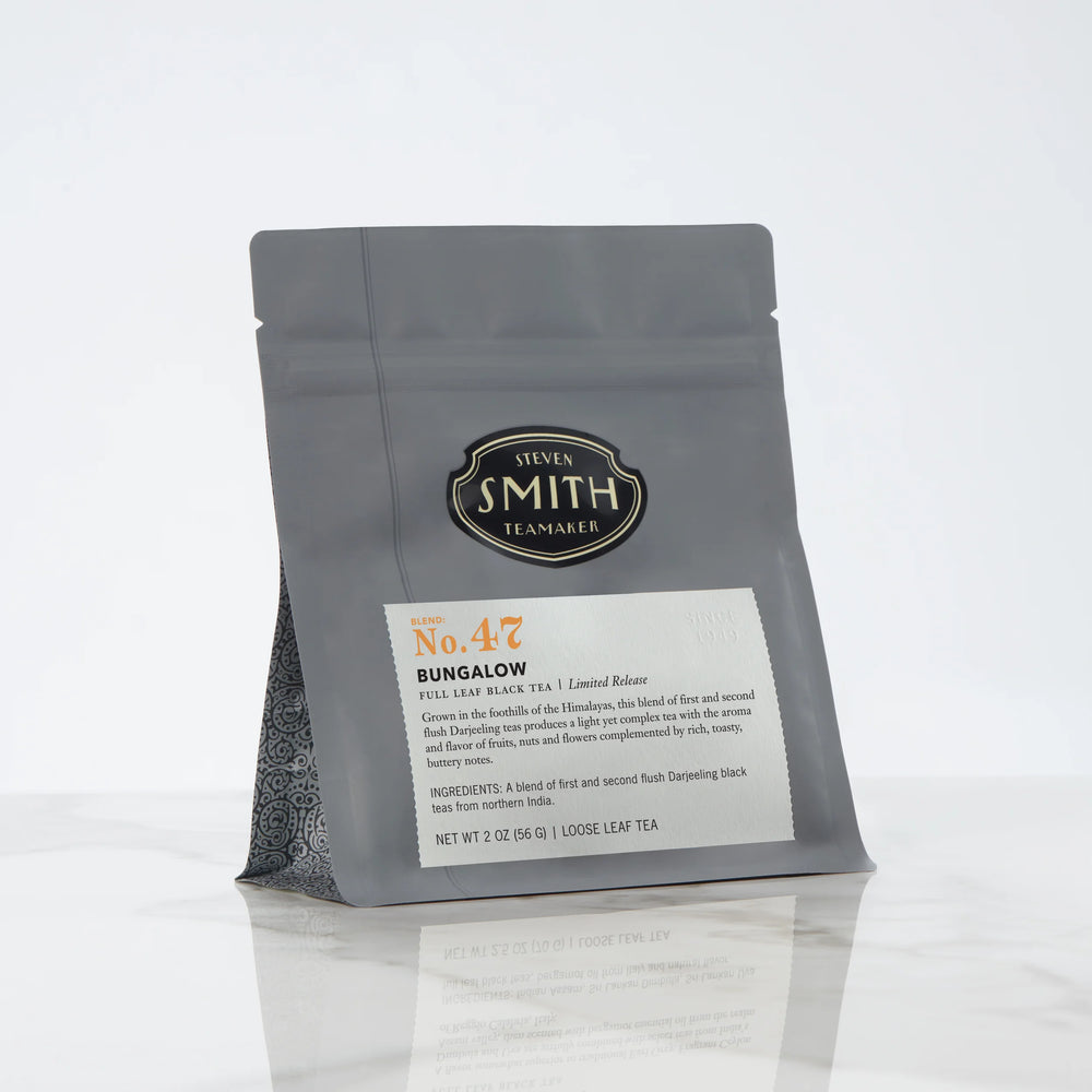 Grey bag of loose leaf Bungalow tea with Smith logo.