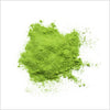 Bright green Matcha Latte Mix powder in a rugged pile to show quality and color.