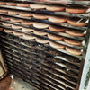 Several racks filled with aging Pu-erh cakes in Yunnan, China.