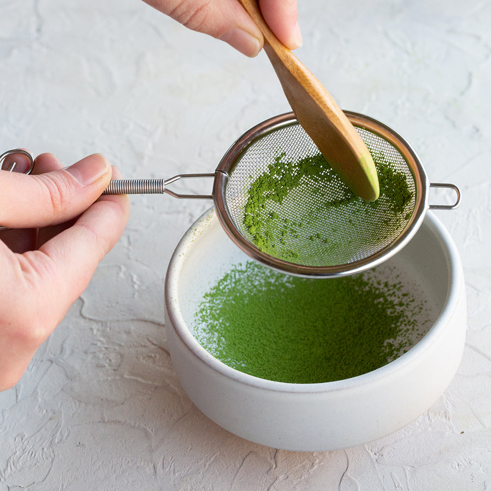 https://www.smithtea.com/cdn/shop/products/Matcha-Sifter-in-use-close.jpg?v=1691779305&width=1000